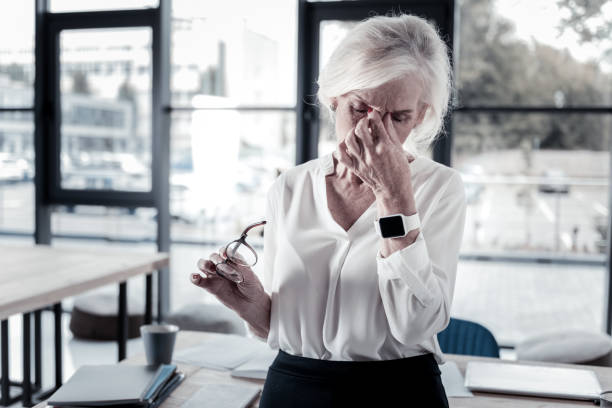 istock Exhausted pensioner dreaming about vacation 936838286