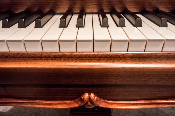 istock Mahogany grand piano keys 936840550