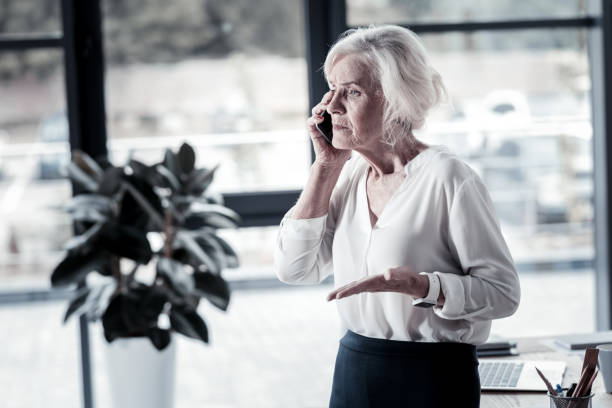 istock Serious woman having important discussion 936840642