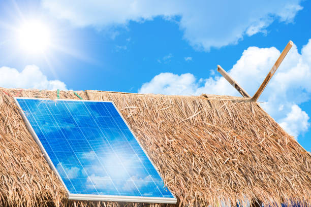 田舎の村の概念に電力を与えるための太陽電池パネル - underdeveloped ストックフォトと画像