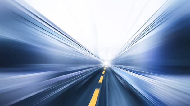 istock blur fast moving high speed road business perform concept 936841738