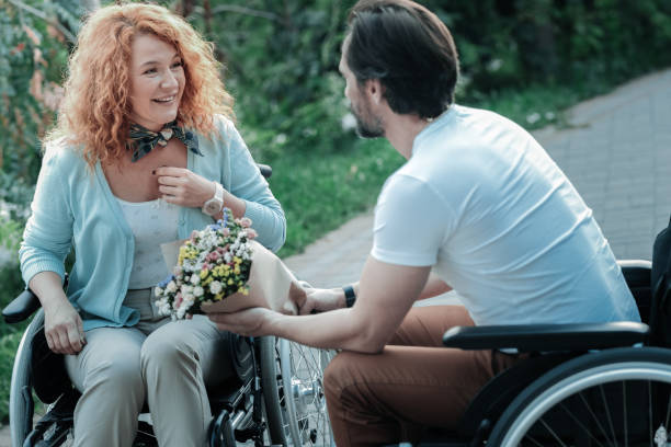 istock Attractive red haired female listening to her man 936841848
