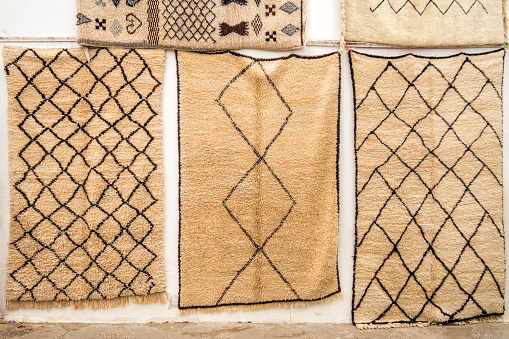 Mohair wool carpets hanging on the wall of the Moroccan souk