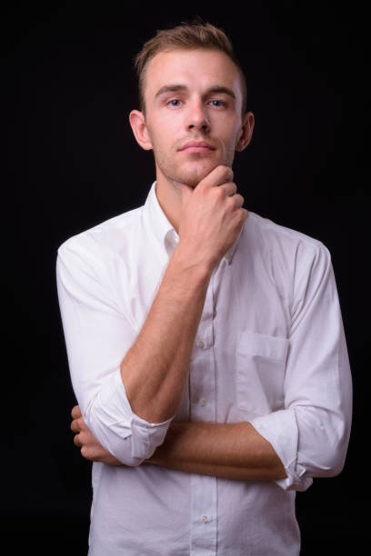 istock Portrait Of Young Handsome Man 936843224