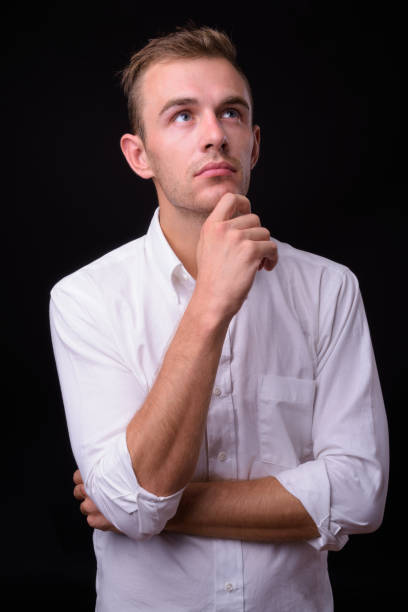 istock Portrait Of Young Handsome Man 936843228