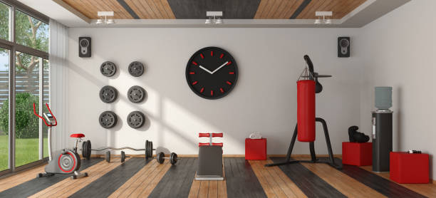 Home gym with sport equipment Home gym with punching bag, cycle and other fitness equipment - 3d rendering
Note: the room does not exist in reality, Property model is not necessary boxing gym stock pictures, royalty-free photos & images