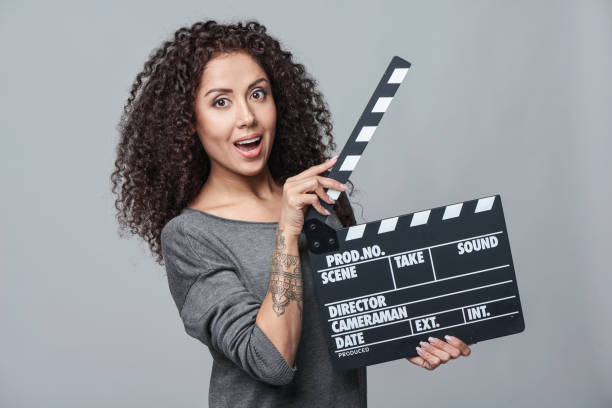 istock Female holding movie clapper board 936849548