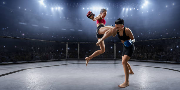 istock Female MMA fighters in professional boxing ring 936850022