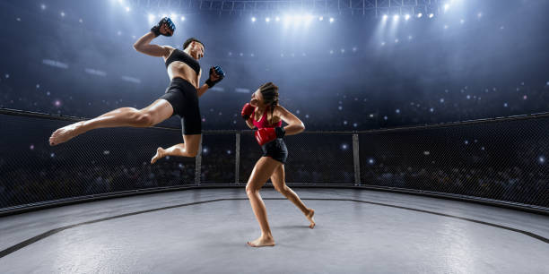 istock Female MMA fighters in professional boxing ring 936850046