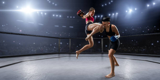 istock Female MMA fighters in professional boxing ring 936850058