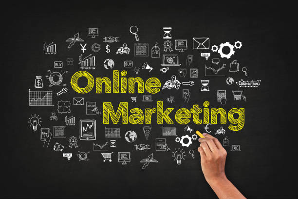 Online Marketing Word On Blackboard With Supportive Icons