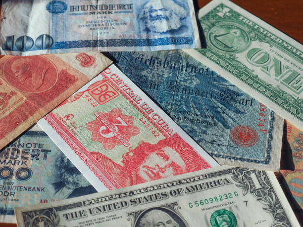 istock vintage money of communist countries and dollar notes 936861966