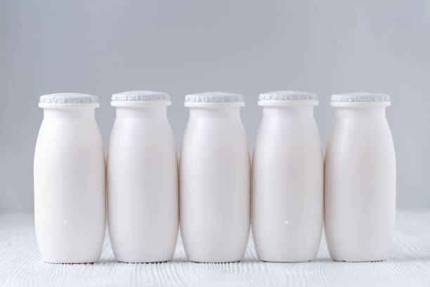 istock five bottles of drink yogurt on gray background 936872138