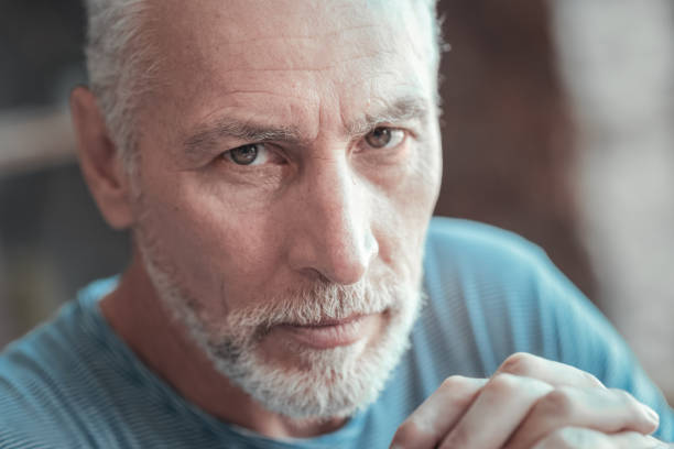 istock Thoughtful serious man thinking and looking straight 936876978
