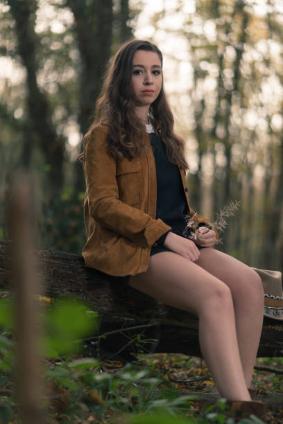 Woman in the autumn forest