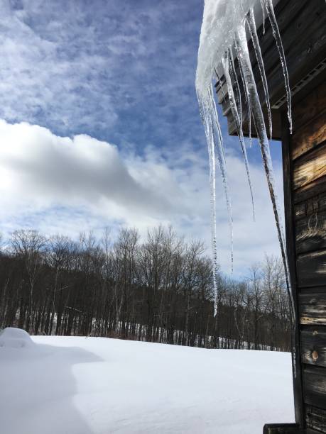 istock Icicles and snow pack in New York 936885714