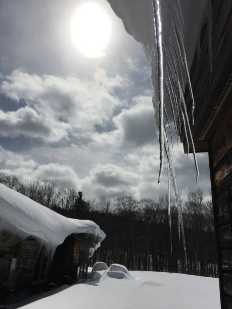 istock Icicles and snow pack in New York 936885818