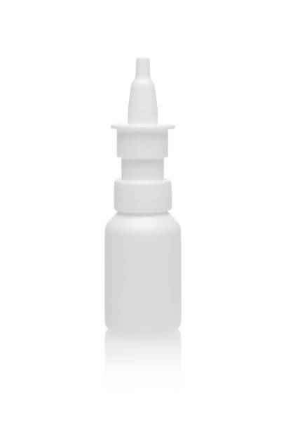 медицина бутылка назальный спрей изолированы на белом - nasal spray allergy bottle body care стоковые фото и изображения