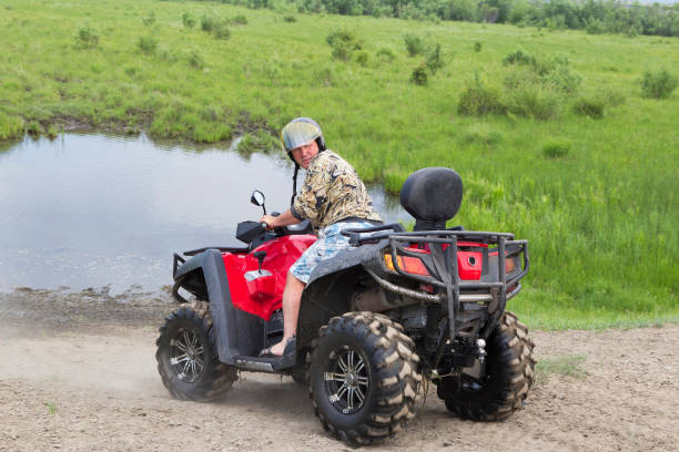 istock Tourists on all-terrain vehicles. On ATV 936894384