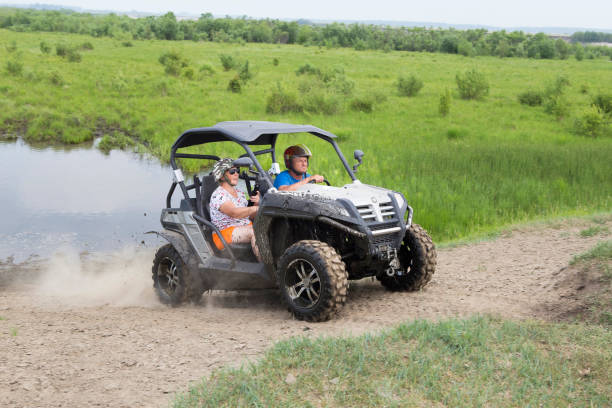 istock Tourists on all-terrain vehicles. On ATV 936894498