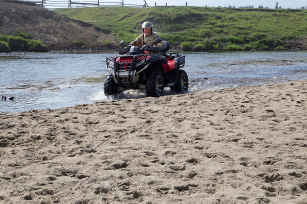 istock Tourists on all-terrain vehicles. On ATV 936894790