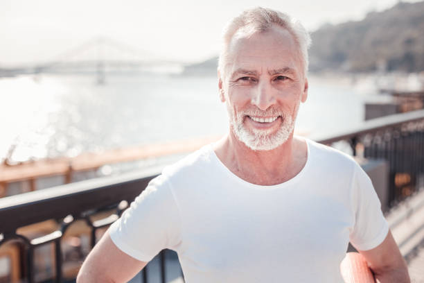 istock Handsome confident man standing and looking straight 936894944
