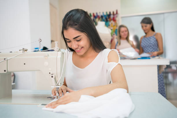 istock Happy dress-making sewing at an atelier 936901638