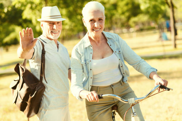 istock Delighted elderly man waving his hand 936907948