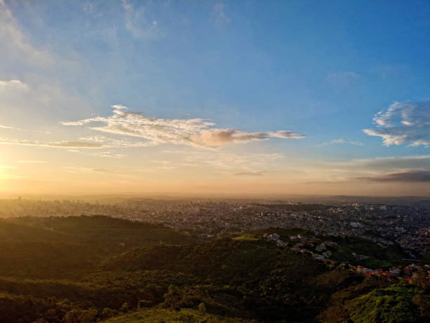 View from the top of the city of Belo Horizonte View from the top of the city of Belo Horizonte and its hills, valleys, and buildings during the sunset in the mountains of the Curral belo horizonte photos stock pictures, royalty-free photos & images