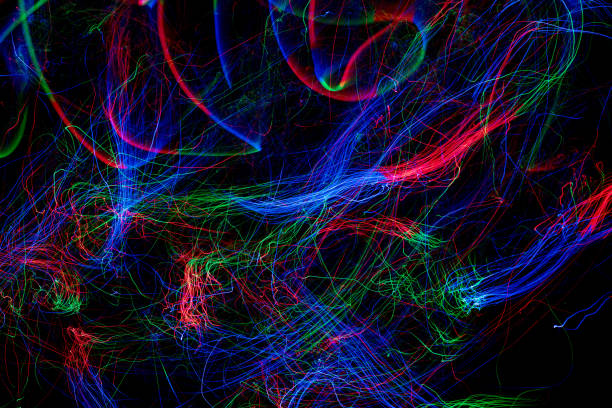 istock Multi color abstract light painting. LED lights on black background 936911426