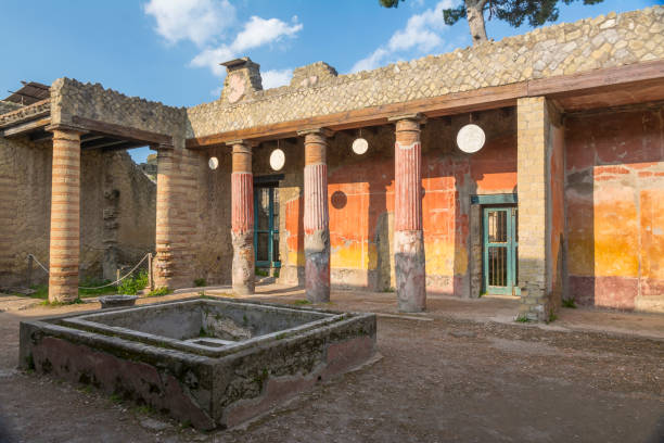 Ercolano ruins site Ercolano, Italy- March 26, 2016: Columns and ruins inside the Herculaneum archeological site near Naples during a summer day. herculaneum stock pictures, royalty-free photos & images