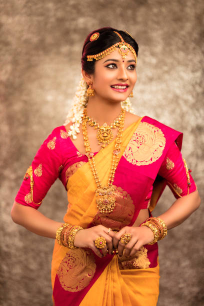 istock Beautiful smiling Indian bride with jewelry 936921426