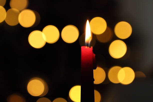 istock Candle lighten Christmas sadness 936924026