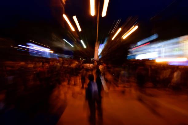 istock Zoom blur of car trail on road 936929574