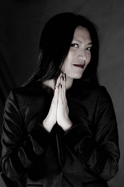 istock Woman in prayer 936932310