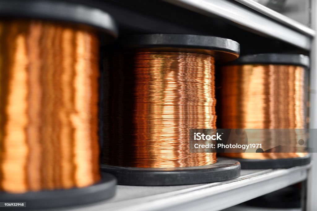 Coils of copper in close up Coils of shiny copper on shelf in close up view Copper Stock Photo