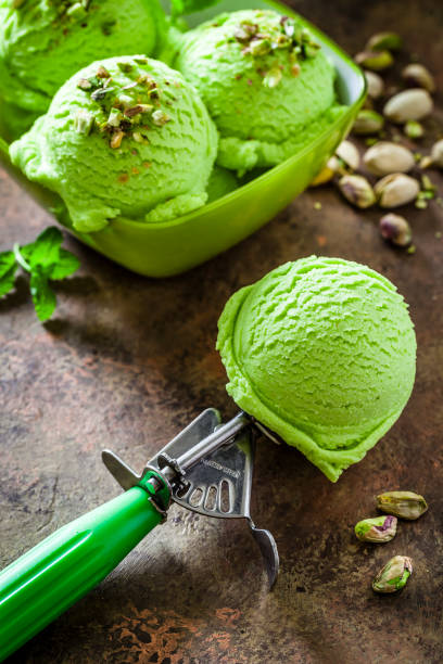 istock Scoop of pistachio ice cream 936933496