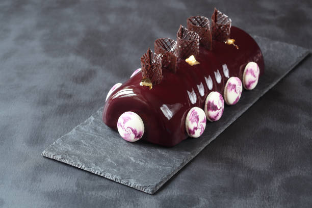 Contemporary Black Currant Chocolate Yule Log stock photo
