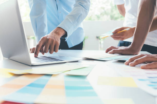 istock Team of Designer working at office. 936942466