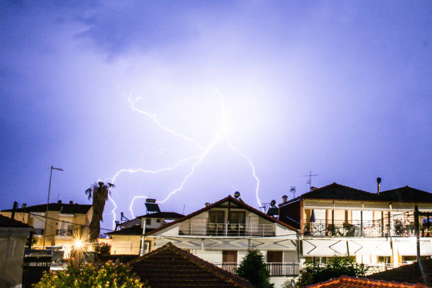 istock Lightning display over houses in Greece 936953162