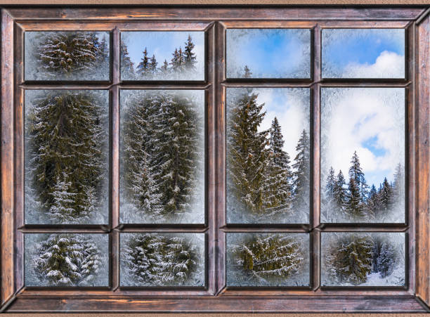 istock the window is covered with ice frost 936955836