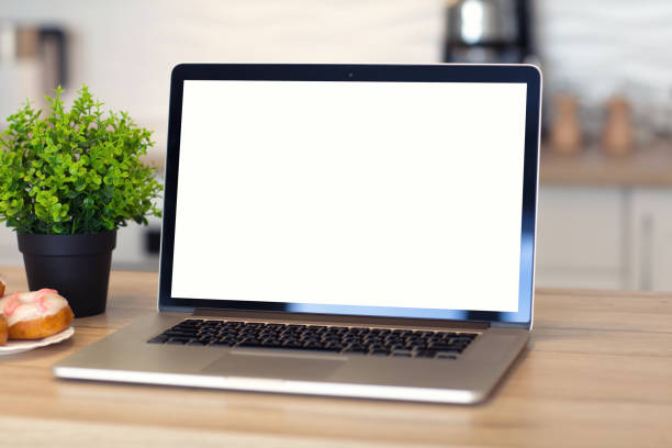 istock notebook with isolated screen is on the table in the room 936961436