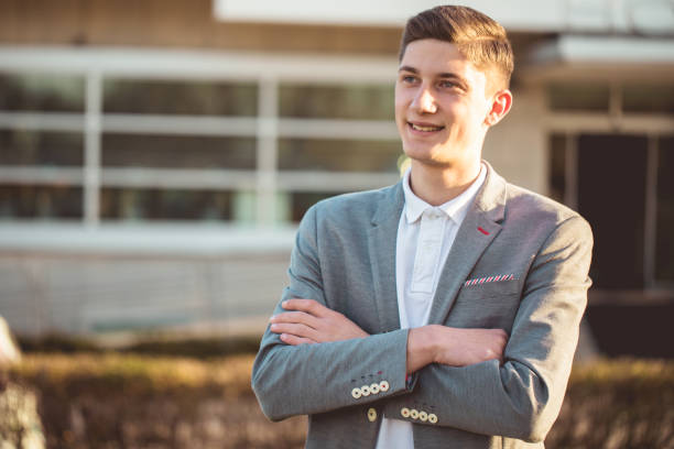 istock Handsome young businessman posing outdoors 936962882