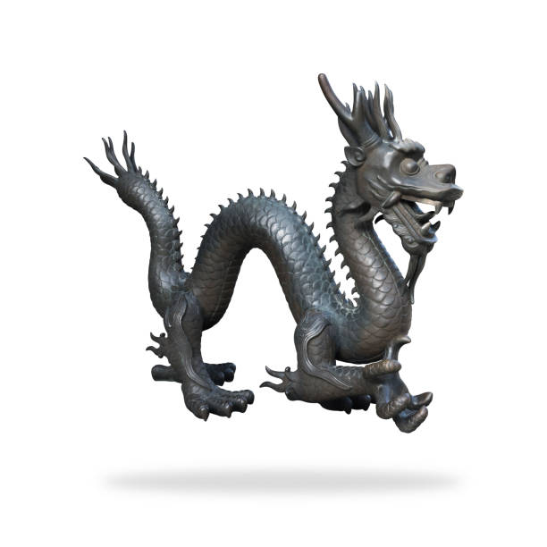Black dragon statue on isolated background with clipping path. Chinese new year powerful symbol.