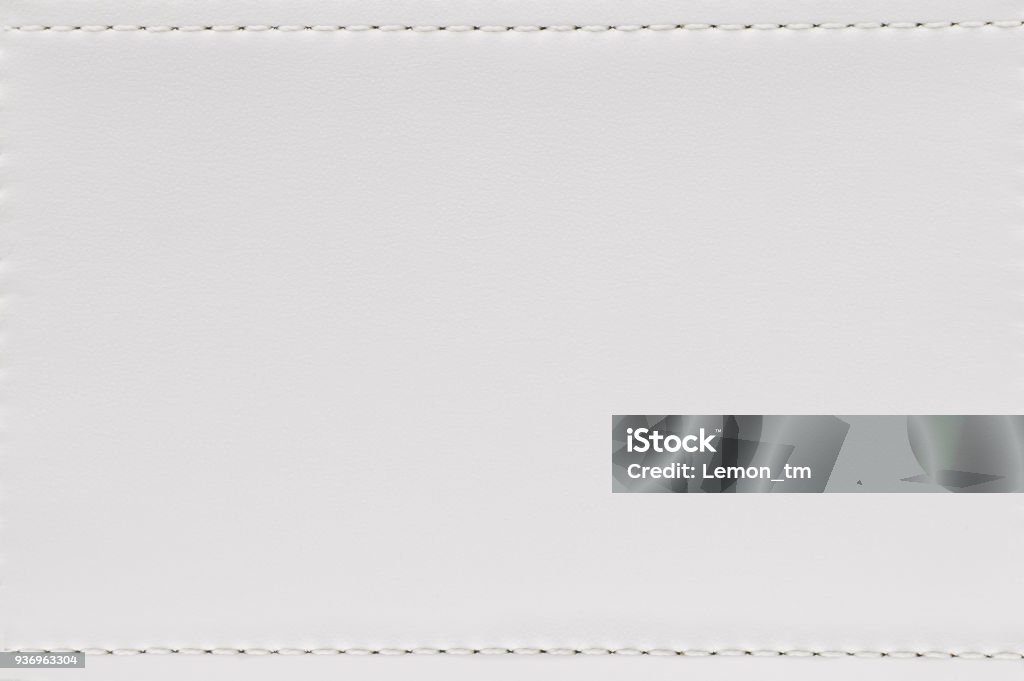 Seam and white leather texture background. Blank material made from animal skin for furniture. Leather Stock Photo