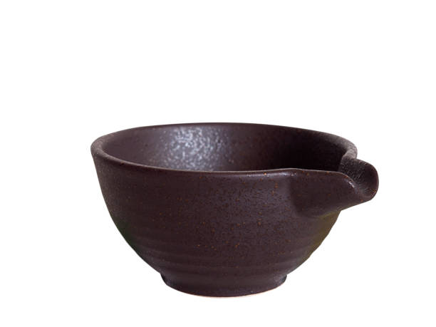 istock cup for grinding herbal medicine. 936972488