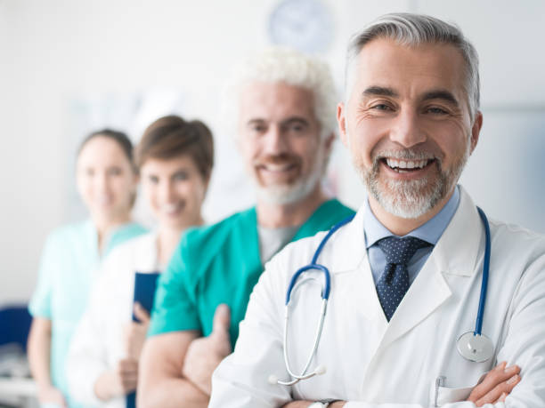 istock Confident doctors posing at the hospital 936981652
