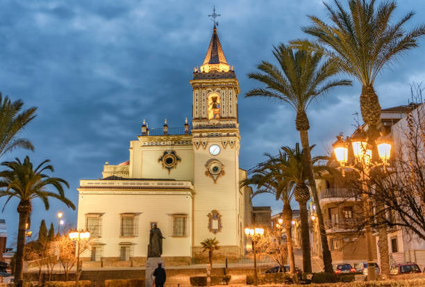 Beautiful San Pedro church and square in the city of Huelva at dusk. stock photo