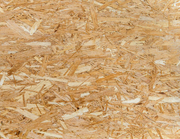 istock Textured background press wood osb strand board full frame image 936987620