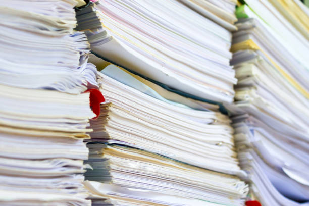 istock Stacks of paper in my office. 936991090